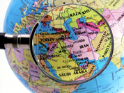 globe with magnified Middle East